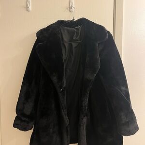 Elegant black faux fur coat